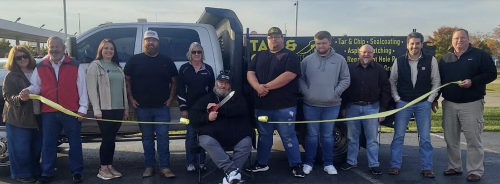 Bruce Stanley with community supporters at a ribbon cutting